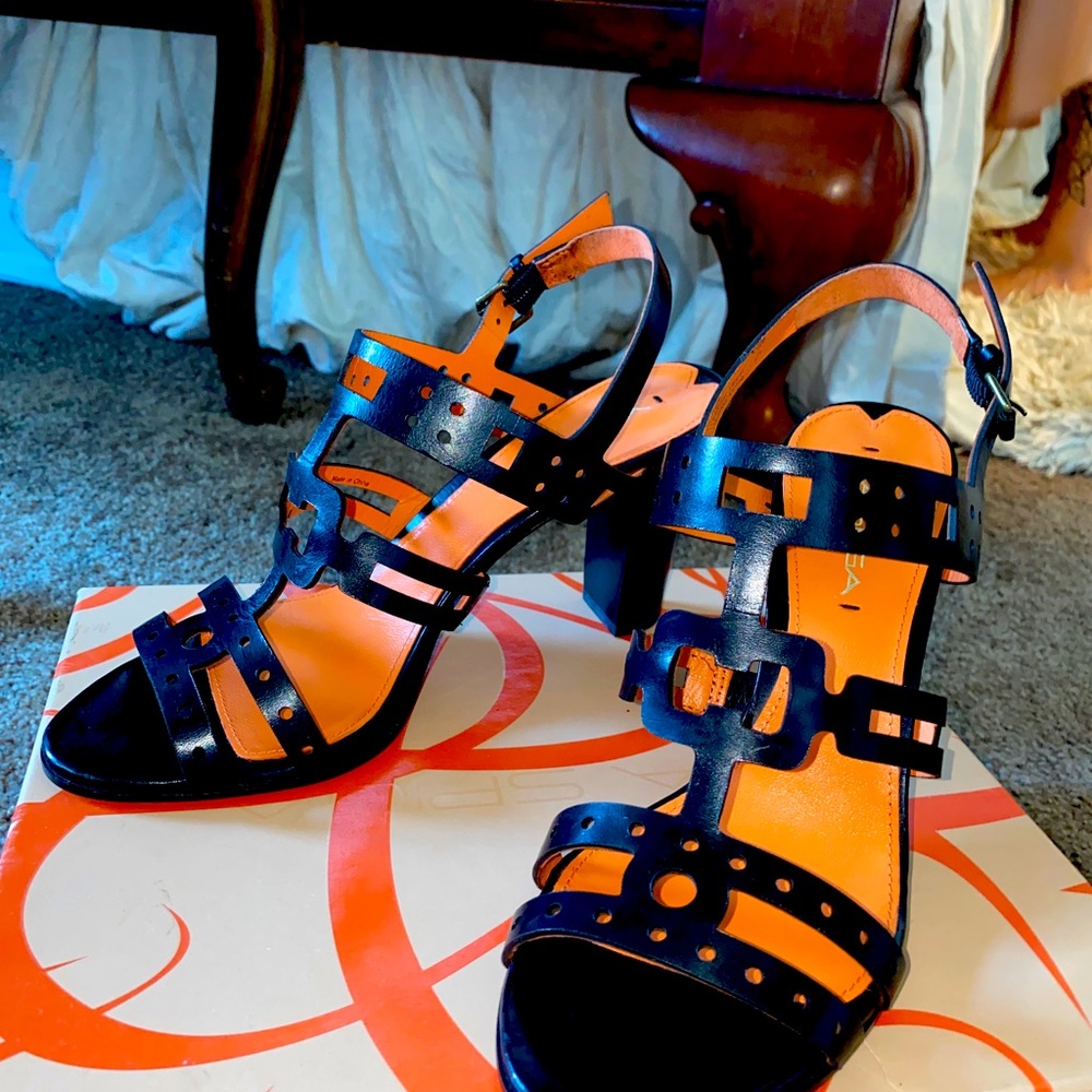 Classy black and orange lady shoes never worn